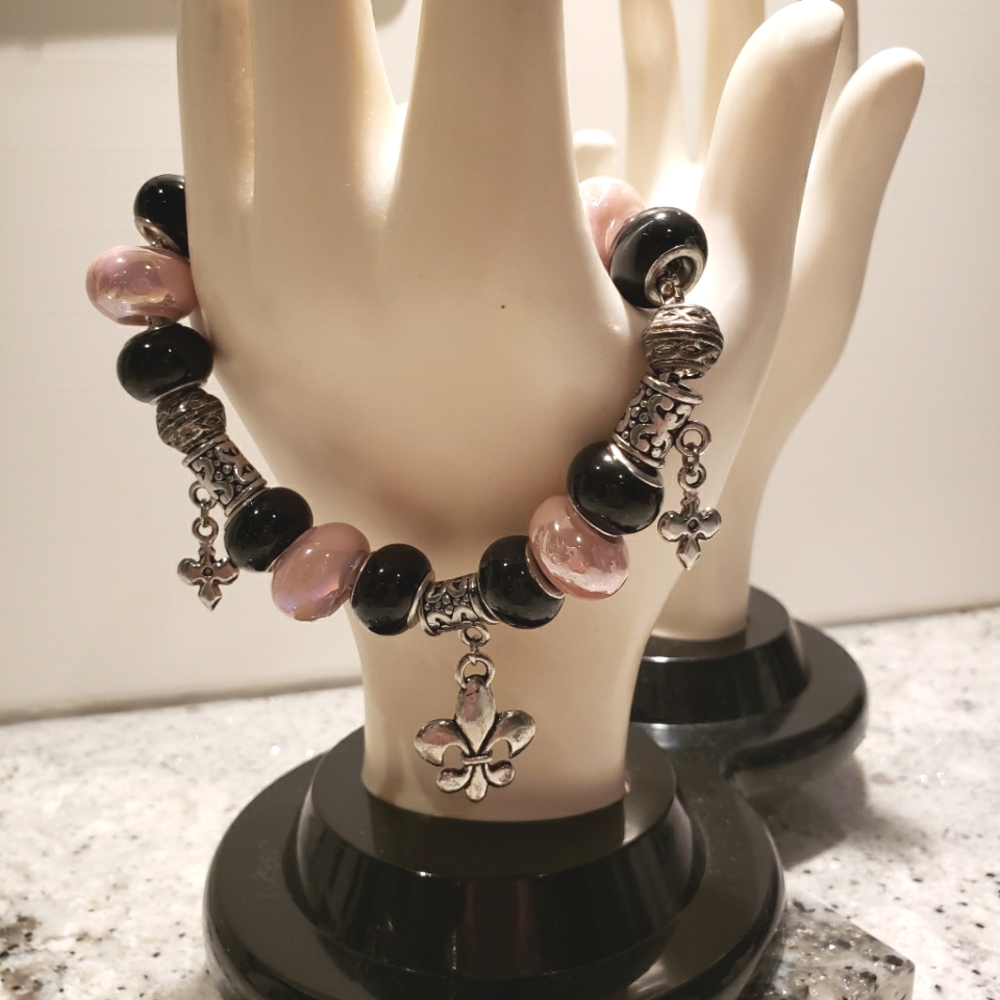 Fleur-de-lis bracelet.